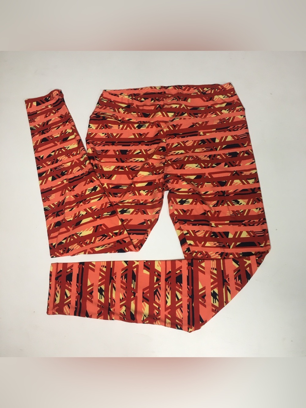 LuLaRoe | Orange & Black Striped Geometric Leggings